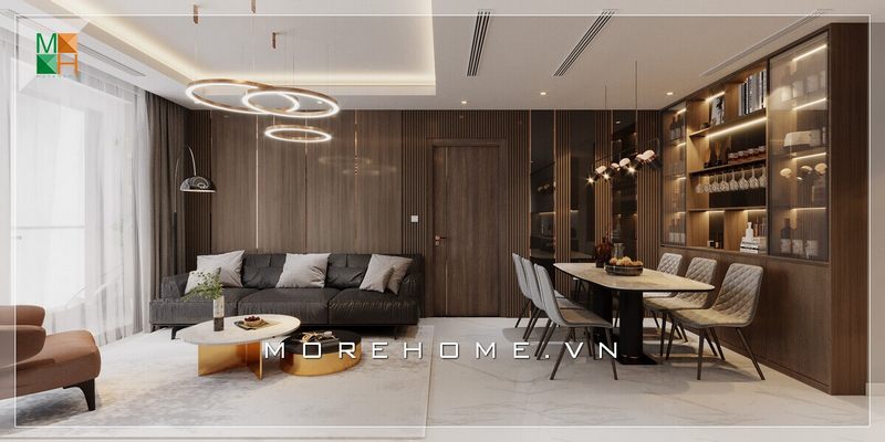 .
Mẫu thiết kế phòng khách và phòng ăn được chia cắt rõ ràng bởi hệ thống trần giật cấp và được trang trí bằng hệ thống đèn thả sang trọng.